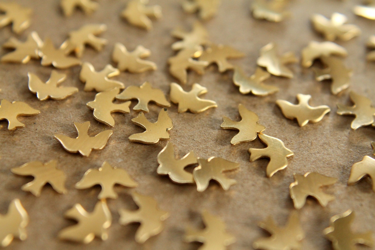 24 pc. Tiny Raw Brass Doves: 8mm by 6mm - made in USA | RB-062