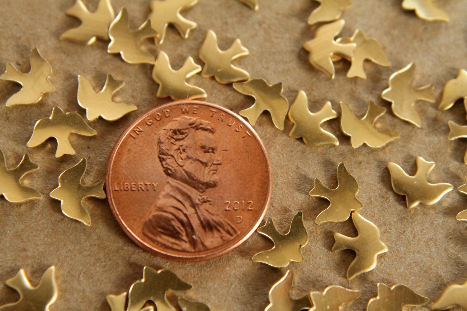 24 pc. Tiny Raw Brass Doves: 8mm by 6mm - made in USA | RB-062