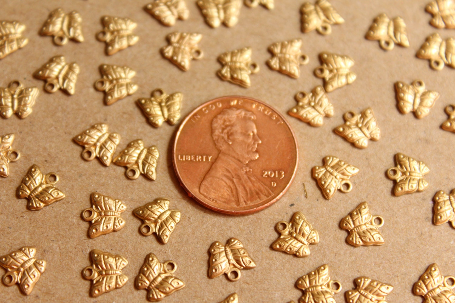 16 pc. Tiny Raw Brass Butterfly Charms: 7mm by 6.5mm - made in USA | RB-864